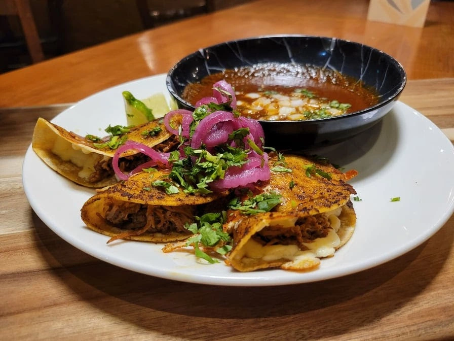 Butter Chicken Pizza — Pizza Blvd's signature Indian fusion pizza in Brampton West